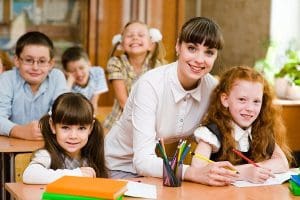 Teacher interacting with a student.