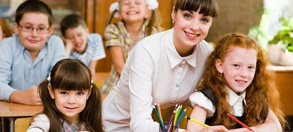 Teacher interacting with a student.